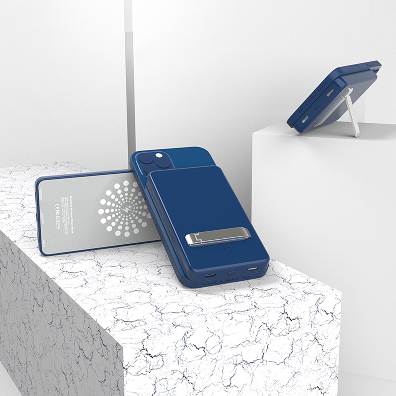 Blue phone case with a metallic accent on a white marble surface