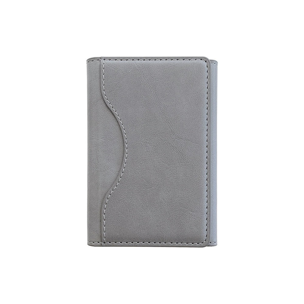 Gray leather wallet on a white background