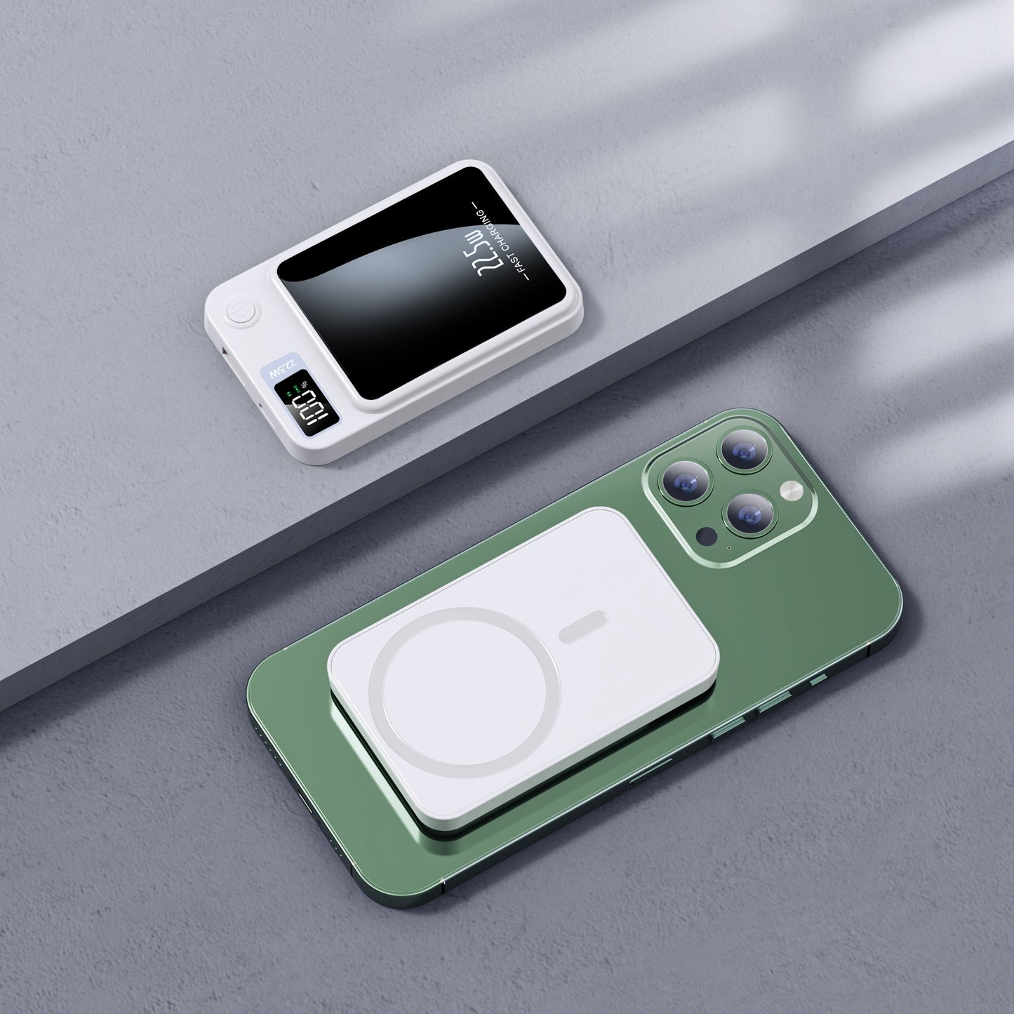 Green phone case with wireless charging pad on a gray surface