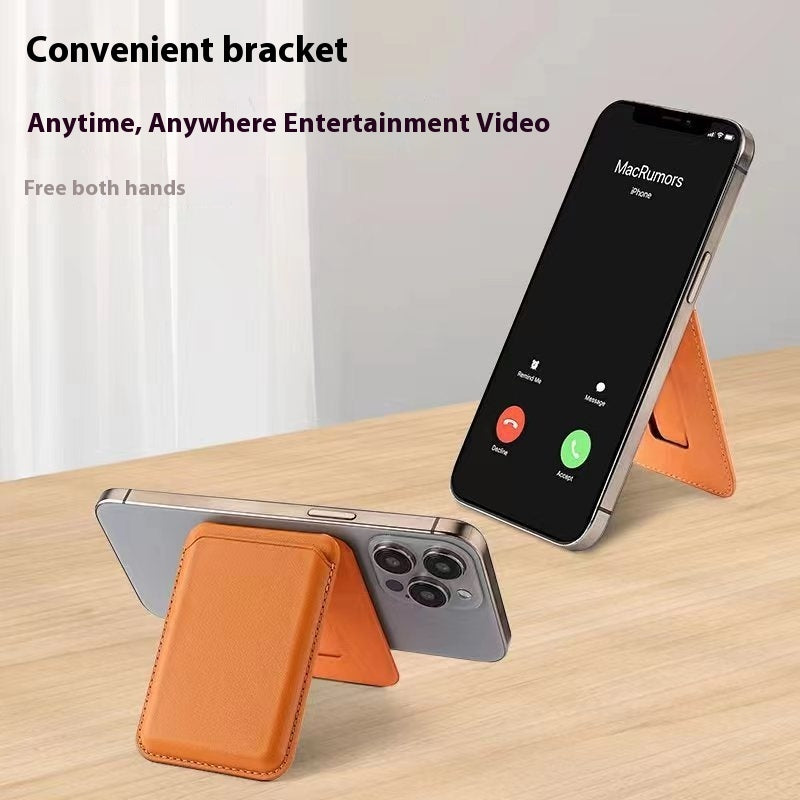 Orange phone stand holding a smartphone on a wooden surface with text about convenience and entertainment.