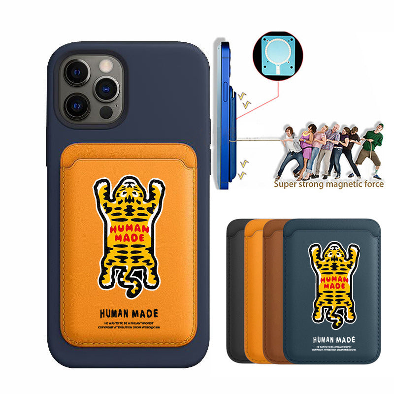 Phone case with tiger design and 'Human Made' branding, featuring a magnetic feature.