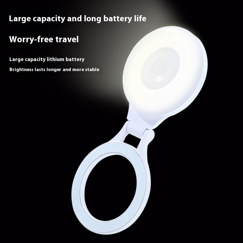 Portable light with text highlighting its features on a black background
