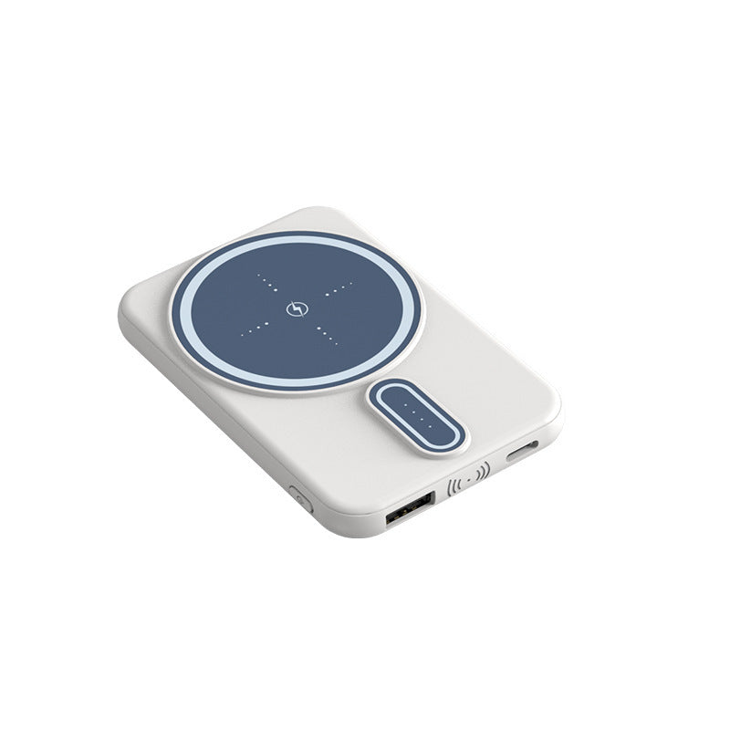 White power bank with blue circular design on a white background