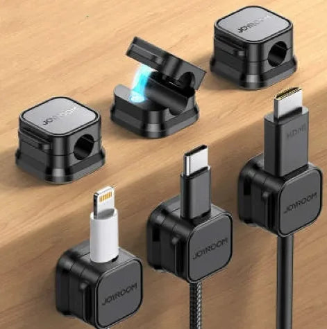 Magnetic cable organizer for tidy desks - holds wires securely, reduces clutter, and works with all cords.