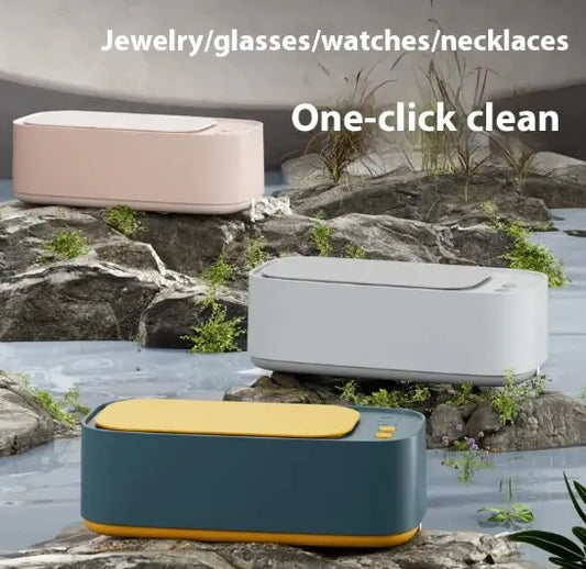 Ultrasonic glasses cleaning machine in green, white, and pink – professional cleaning at home.