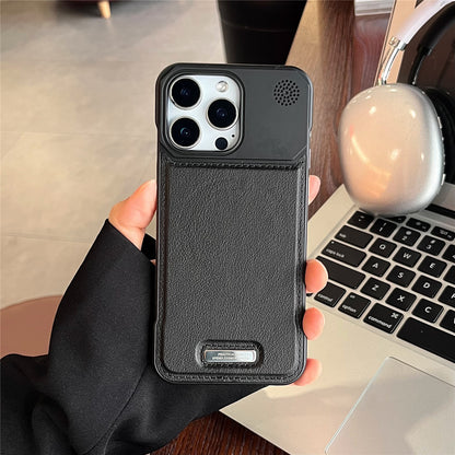 Black phone case held by a person with a laptop and apple in the background