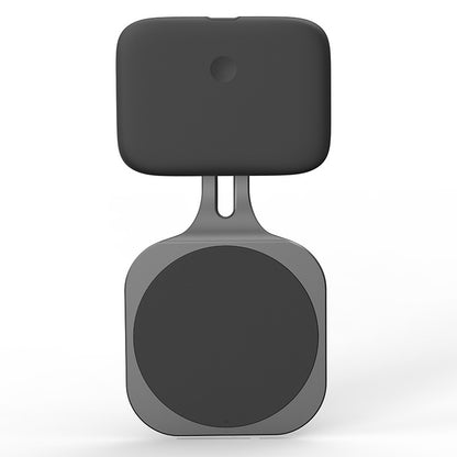 Black square-shaped device with a circular component on a white background