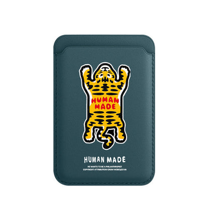 Blue cardholder with a yellow and black panther illustration and 'Human Made' branding on a white background.