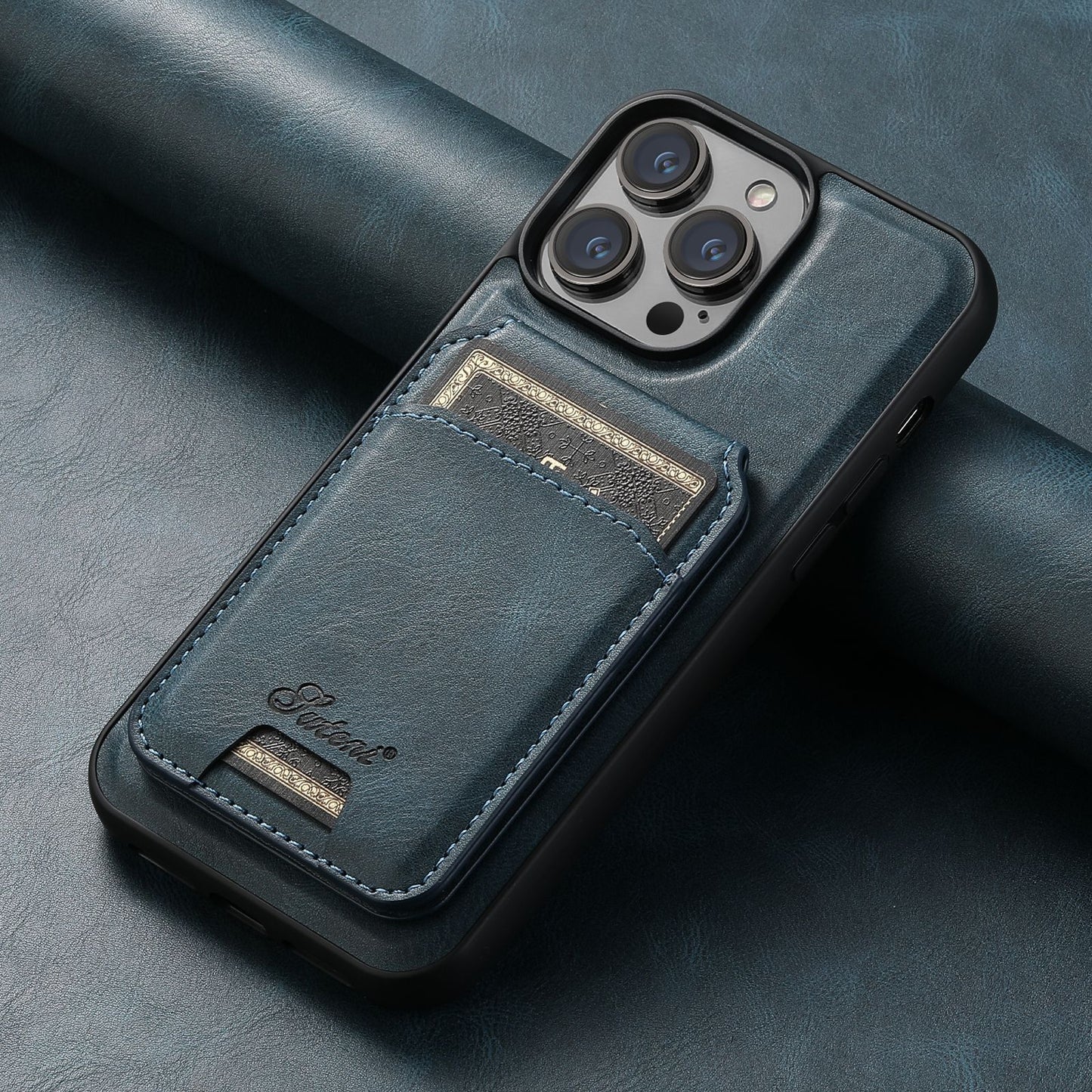 Blue phone case with card holder on a dark surface