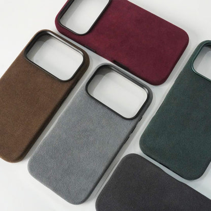 Collection of phone cases in various colors on a white background