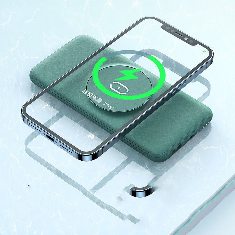 Green wireless charging pad with a smartphone on top, displaying a charging icon.