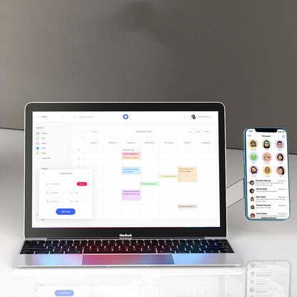 Laptop and smartphone displaying a calendar application on a reflective surface with a dark background