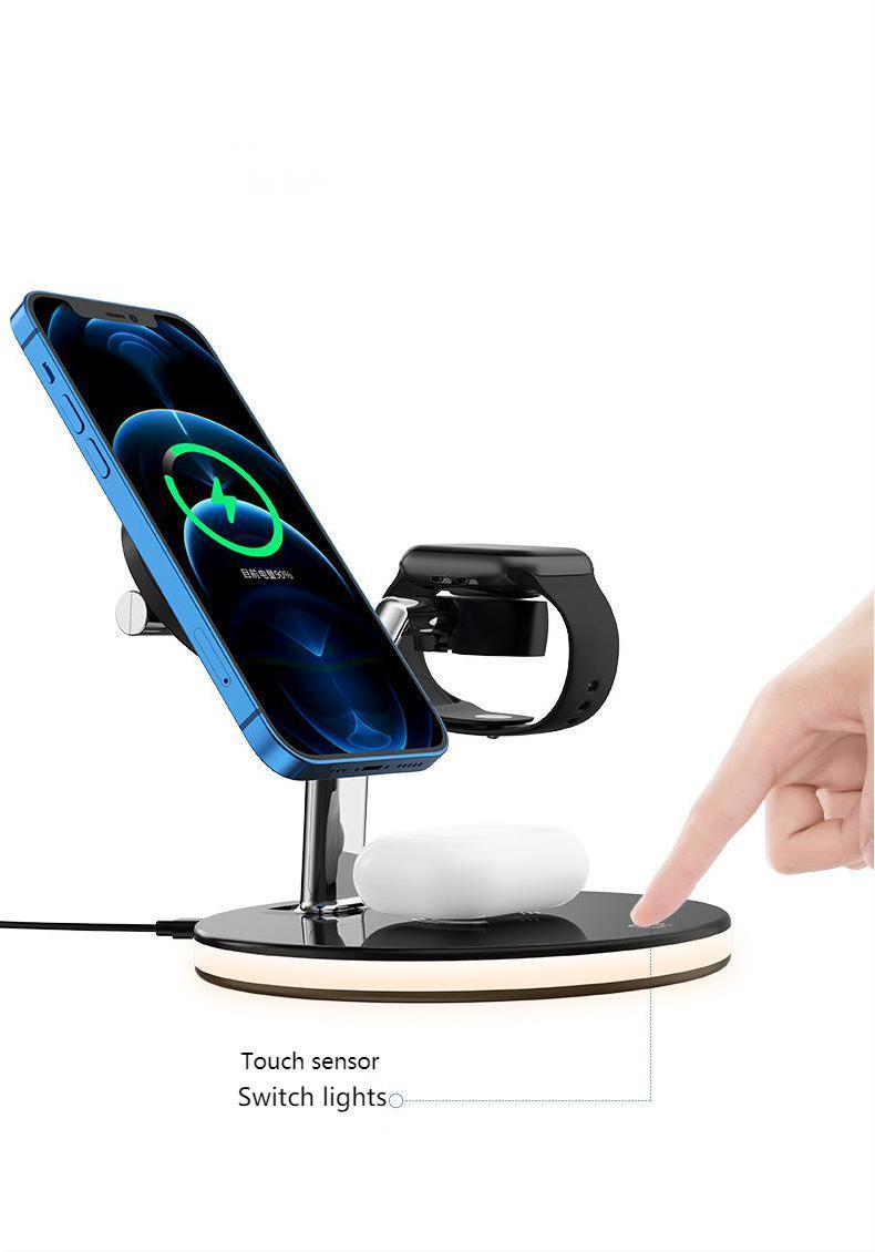 Multi-device charging stand with smartphone, smartwatch, and wireless charger on a white background