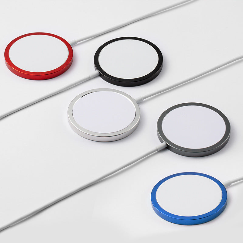 Set of circular charging pads in red, black, silver, gray, and blue on a light background.