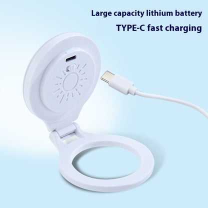 White electronic device with a charging cable on a light blue background