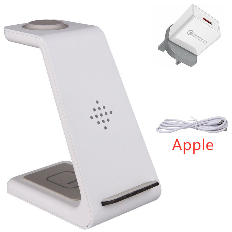 White phone stand with Apple logo, power adapter, and cable on a white background