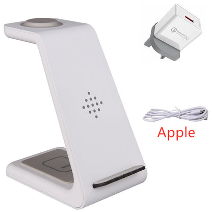 White phone stand with Apple logo, power adapter, and cable on a white background